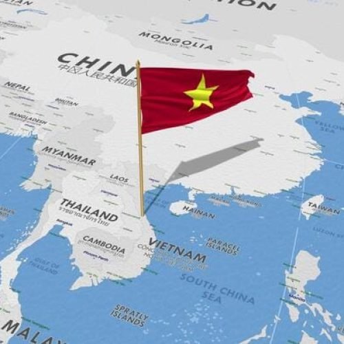 vietnam-flag-waving-with-the-world-map-seamless-loop-in-wind-3d-rendering-free-video.jpg